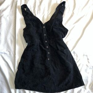 Black corduroy mini dress with button up detailing #minidress
